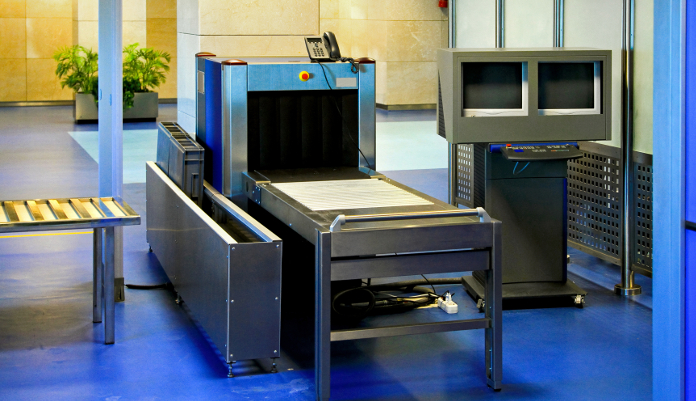 search with metal detector at airport